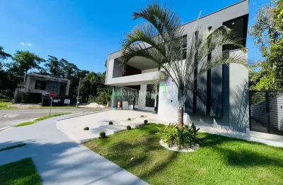 ALPHAVILLE 4 - CASA TÉRREA ESPETACULAR À VENDA NO ALPHAVILLE 4 – PONTA NEGRA 4 Suítes | Pé-direito Duplo | Fachada Imponente | Altíssimo Padrão