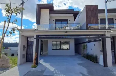 Casa à venda em Cajamar-SP, bairro Portais (Polvilho): 3 quartos, 3 suítes, 2 salas, 4 banheiros, 2 vagas de garagem, 188 m².