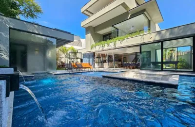 Impecável mansão de 6 quartos na riviera em bertioga-sp: 6 suítes, 3 salas, 8 banheiros, 6 vagas e 610m².