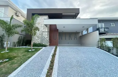 Residência de luxo no swiss park: casa em condomínio com 4 suítes, 2 salas e 305m² em campinas-sp