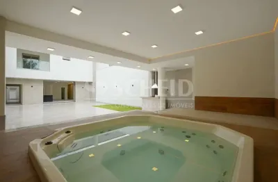 Casa a venda com 607 m² 4 quartos sendo 4 suítes, 6 vagas