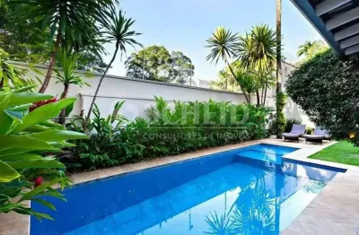 Casa de condomínio com 4 quartos e 6 banheiros à venda, 865 m² por r$ 6.900.000