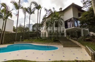 Casa de luxo chácara flora 5 suítes, piscina e salão de festa distribuídos em 1.274m² de terreno