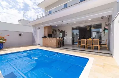 Linda casa de alto padrão com 4 suítes, sistema solar e área gourmet: sofisticação e sustentabilida