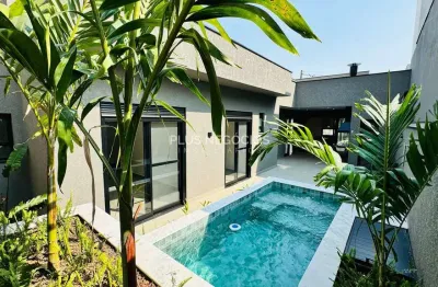 Deslumbrante casa térrea a venda com piscina e 3 suítes + home office no exclusivo condomínio resid