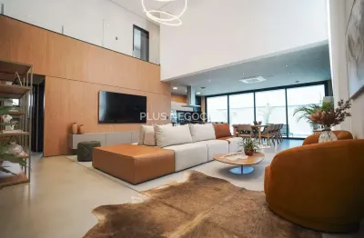 Alphaville nova esplanada 1: sobrado de luxo 'porteira fechada' – 4 suítes, automação & piscina aqu