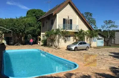 ## chácara à venda com 05 quartos sendo 02 suítes, terreno total em 5.000 m², localizado no bairro