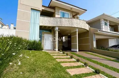 Casa em condomínio semimobiliada com 4 quartos (1 suíte)