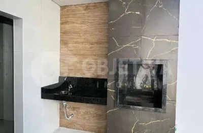 Casa com 3 quartos à venda no Santa Mônica, Uberlândia 