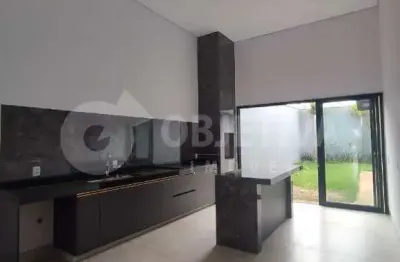 Linda casa térrea com ótima localização e espaços integrados a venda no bairro planejado quinta alto umuarama em uberlândia