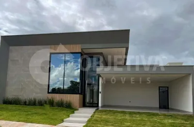 Encantadora casa térrea disponível para venda no conceituado condomínio arts em uberlândia