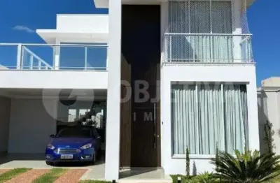 Casa estilo sobrado disponível para venda no condomínio reserva dos ipês em uberlândia