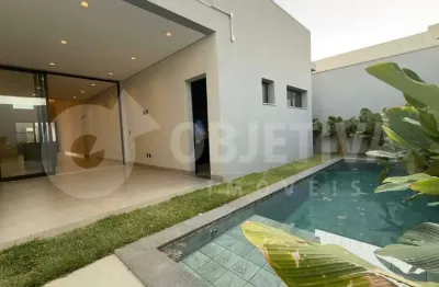 Belíssima casa nova com piscina aquecida disponível para venda no bairro planejado bem viver sul uberlândia