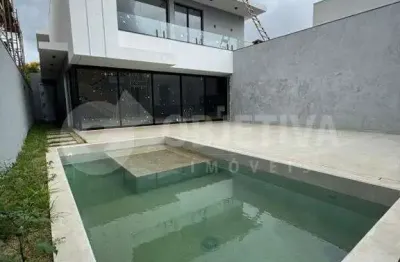 Casa em condomínio à venda, 3 quartos, 4 suítes, 4 vagas, varanda sul - uberlandia/mg