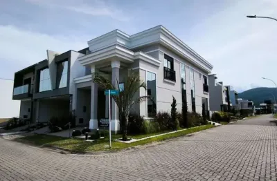 Casa alto padrão de 3 quartos em condomínio fechado no bairro planejado deltaville em biguaçu/sc!