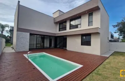 Casa alto padrão a venda em condomínio ao lado do costão golf