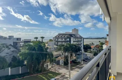 Apartamento com vista mar - 2 suítes, 2 vagas - bairro joão paulo - florianópolis - sc