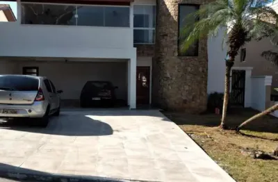 Casa em condomínio fechado com 4 quartos à venda na alameda tubarão, alphaville, santana de parnaíba, 450 m2 por r$ 2.600.000