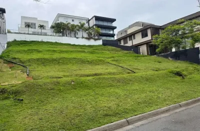 Terreno em condomínio fechado à venda na alameda das aroeiras, alphaville, santana de parnaíba por r$ 1.550.000