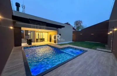 Casa térrea, 3 suítes, acabamento alto padrão, terreno 480m2, área útil 165m2.