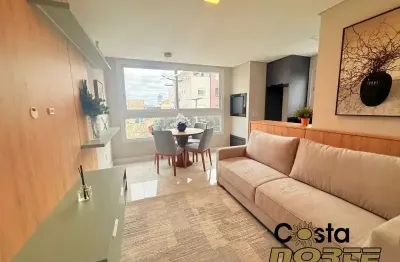 Apartamento mobiliado e decorado junto av da igreja em tramandaí