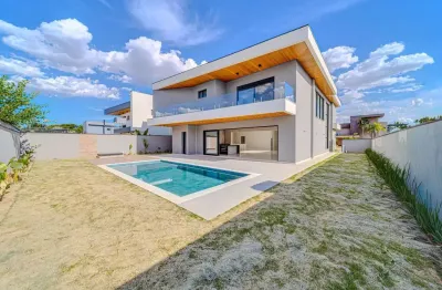 Casa com 4 dormitórios à venda, 400 m² por r$ 5.990.000,00 - condomínio reserva do paratehy - são josé dos campos/sp