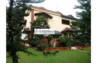 Chácara com casa principal com 4 suites, piscina, jardim, baias de cavalo