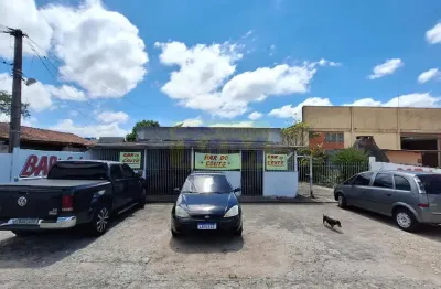 Terreno com 600m² no emiliano perneta com duas residencias e comércio