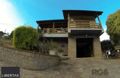 Casa com 3 quartos à venda na Rua Ida Passuello, 2486, Vila Nova, Porto Alegre