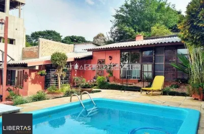 Casa com 6 quartos à venda na Avenida Arnaldo Bohrer, 171, Teresópolis, Porto Alegre