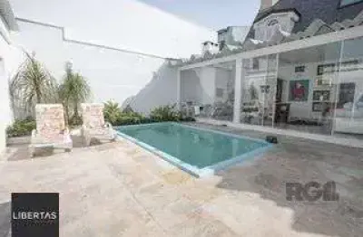 Casa com 3 quartos à venda na Rua Gustavo Schmidt, 592, Três Figueiras, Porto Alegre