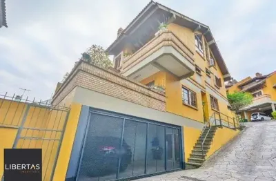 Casa com 3 quartos à venda na Rua Edgar Luiz Schneider, 54, Jardim Isabel, Porto Alegre