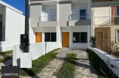 Casa com 3 quartos à venda na Rua Itacyr Rossi, 195, Guarujá, Porto Alegre