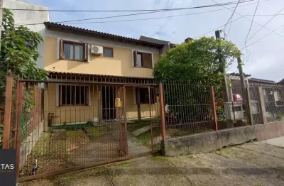 Casa com 4 quartos à venda na Rua Doutor Cláudio Walter Ferreira da Silva, 191, Guarujá, Porto Alegre