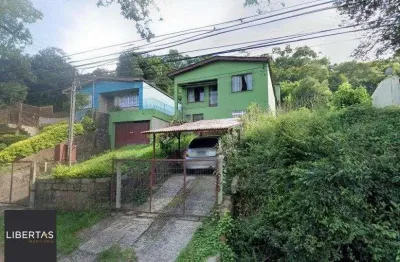 Casa 280m² - 5 dormitórios, 4 banheiros, 2 vagas no bairro Cascata