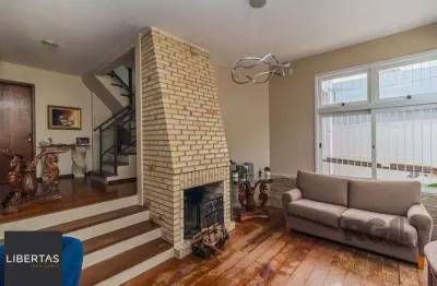 Casa com 3 quartos à venda na Rua Márcio Dias, 480, Nonoai, Porto Alegre