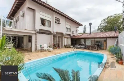 Casa com 3 quartos à venda na Avenida Montreal, 356, Jardim Lindóia, Porto Alegre