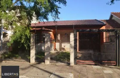 Casa com 3 quartos à venda na Rua Dinarte de Albuquerque, 35, Parque Santa Fé, Porto Alegre