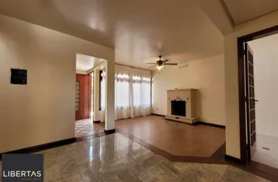 Casa com 4 quartos à venda na Rua Tupanciretã, 34, Passo da Areia, Porto Alegre