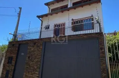Casa com 4 quartos à venda na Rua Dezessete de Junho, 406, Menino Deus, Porto Alegre