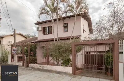 Casa com 4 quartos à venda na Rua Três Passos, 107, Passo da Areia, Porto Alegre