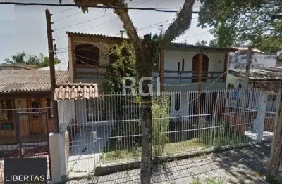 Casa com 4 quartos à venda na Rua Mathilde Zatar, 128, Nonoai, Porto Alegre