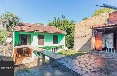 Casa de 5 dormitórios à venda no Bairro Bom Jesus - Porto Alegre