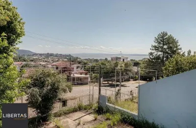 Casa com 3 quartos à venda na Avenida Leonardo Carlucci, 140, Espírito Santo, Porto Alegre