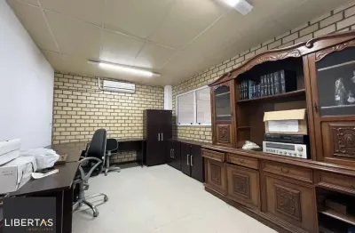 Prédio Comercial à venda com 5 salas, 400m², 6 vagas, Rua Laudelino Freire no bairro Sarandi em Porto Alegre