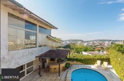 Casa com 5 quartos à venda na Rua Coroados, 536, Vila Assunção, Porto Alegre