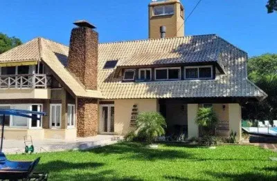 Venda Casa maravilhosa em terreno de 8.125m² com acesso ao Rio Guaiba,  na Estrada Retiro da Ponta Grossa - Porto Alegre