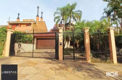 Casa com 4 quartos à venda na Rua Doutor Barbosa Gonçalves, 610, Chácara das Pedras, Porto Alegre