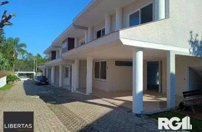 Casa em condomínio fechado com 3 quartos à venda na Avenida Coronel Marcos, 1460, Pedra Redonda, Porto Alegre