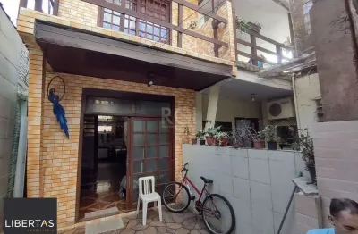 Casa com 6 quartos à venda na Avenida Eduardo Prado, 1791, Cavalhada, Porto Alegre